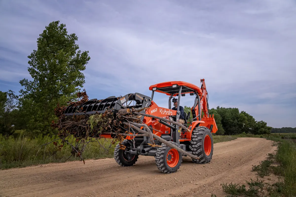 Kubota M62 with grapple